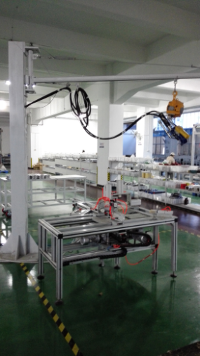 Ergonomic overhead hanger and riveting machine configuration