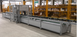 Automatic busbar packing machine in operation demonstrating straight length busbar moisture-proof processing