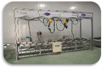Pre-assembly station of the manual compact busbar assembly machine showing aluminum frame